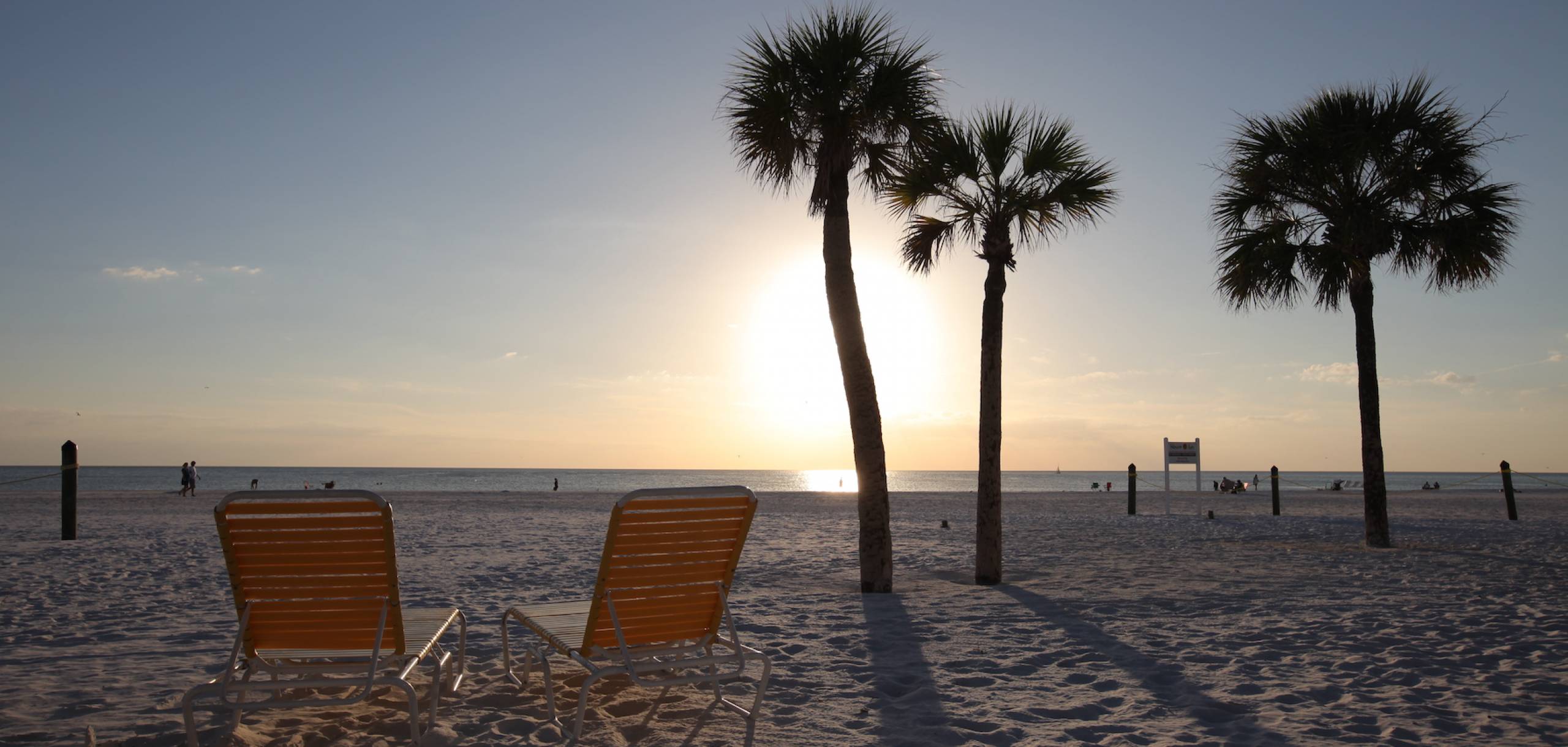 lounge chairs on beach in Siesta Key